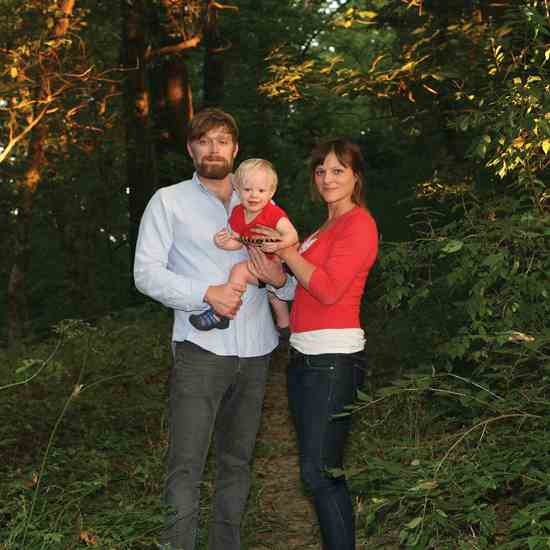 
Homeowners Jessica Kellner and James Duft and their son enjoy the trails in the 14 acres of woods they share with their neighbors.
